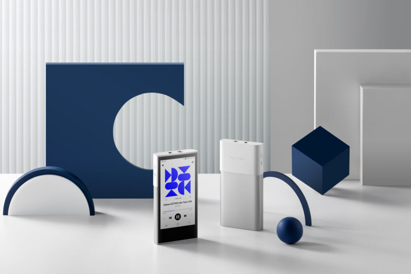 Two portable devices, including the sleek Astell&Kern P1, are displayed on a white surface surrounded by blue and white geometric shapes. The device on the left features a screen showing playback controls.